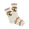 Pair of cream crew socks with brown mushroom illustration, 'Let's Take a Trip' text, and southwestern-style border.