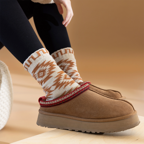 [lf] Close-up lifestyle shot of the socks and clogs, highlighting the cozy comfort.