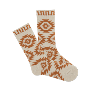 front view of a pair of cream and brown socks with a western motif.