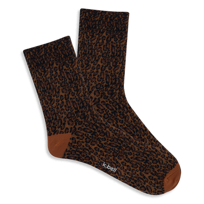 Pair of brown microfiber anklet socks with a dark brown and black leopard print. Solid reddish-brown heel and toe.