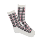 Pair of white crew socks with a pink and black plaid pattern and ruffled cuffs, angled on a white background.