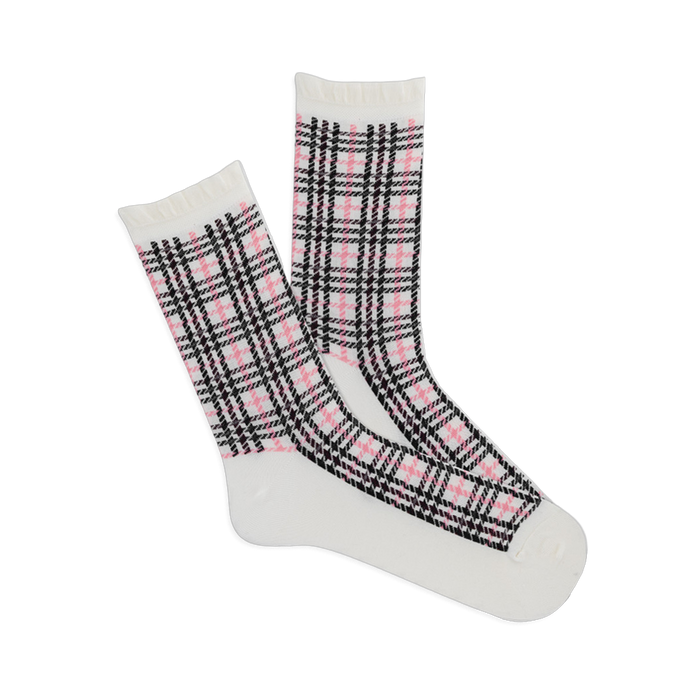 Pair of white crew socks with a pink and black plaid pattern and ruffled cuffs, angled on a white background.