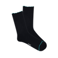 Pair of black ribbed wool blend crew socks with a teal scalloped cuff and a thin teal line on the toe, laid flat.