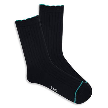 Pair of black ribbed wool blend crew socks with a teal scalloped cuff and a thin teal line on the toe, laid flat.