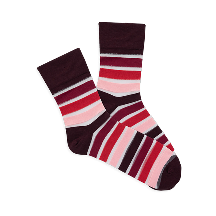 Pair of microfiber crew socks with maroon base and horizontal stripes in shades of red, pink, and translucent white.
