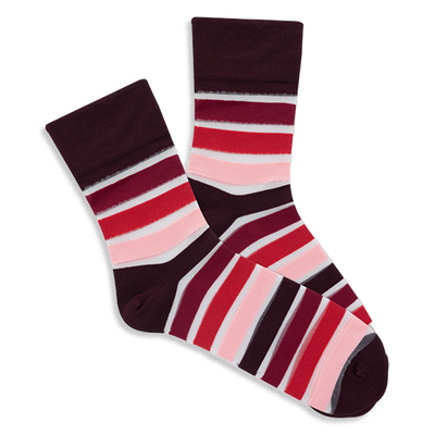 Pair of microfiber crew socks with maroon base and horizontal stripes in shades of red, pink, and translucent white.