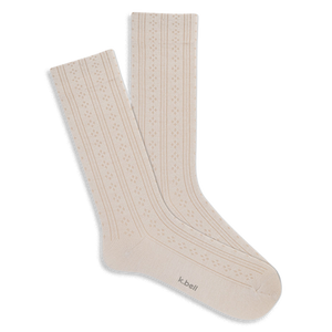 Pair of light cream crew socks with a subtle vertical pointelle knit pattern, featuring narrow stripes and openwork details.