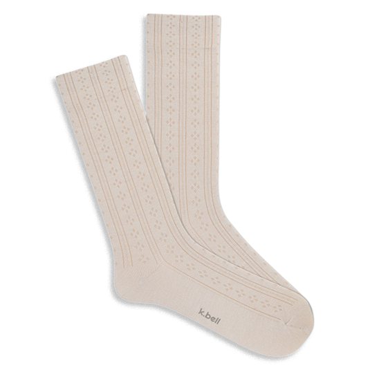 Pair of light cream crew socks with a subtle vertical pointelle knit pattern, featuring narrow stripes and openwork details.