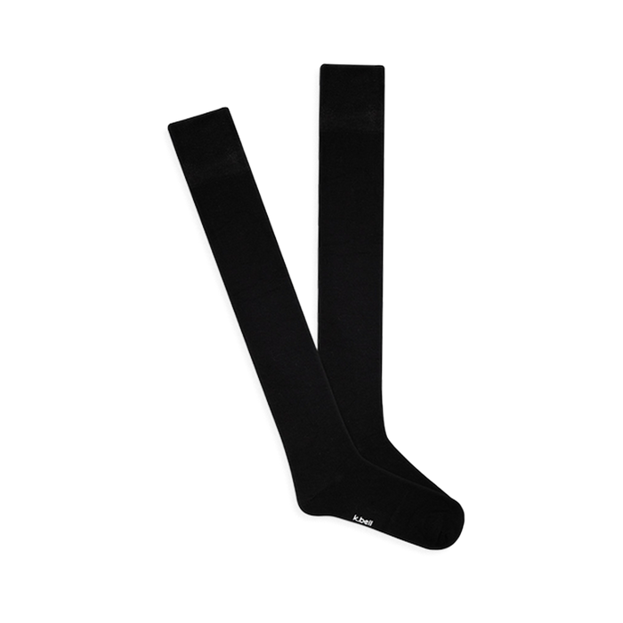 A pair of solid black knee-high socks, laid flat and slightly overlapping, showing the smooth Modal fabric and comfort top.