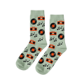 Pair of light green crew socks with a repeating pattern of black vinyl records, orange boomboxes, and black music notes.