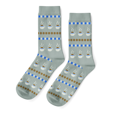 Pair of light grey crew socks with a repeating pattern of steaming coffee cups, brown coffee beans, and blue dashed stripes.