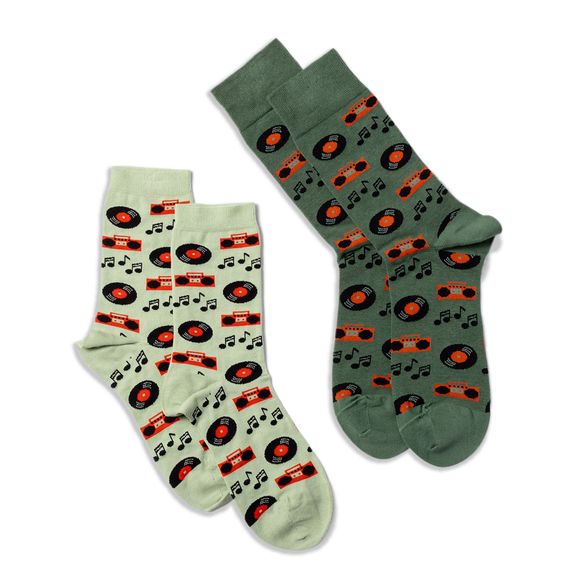 Two pairs of crew socks: one light green and one darker green, both featuring a music record and boombox pattern.
