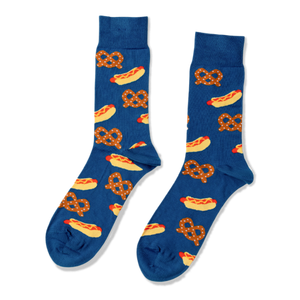 Pair of blue crew socks with a repeating pattern of yellow hot dogs with red sausages and mustard, and brown pretzels.