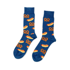 Pair of blue crew socks with a repeating pattern of yellow hot dogs with red sausages and mustard, and brown pretzels.
