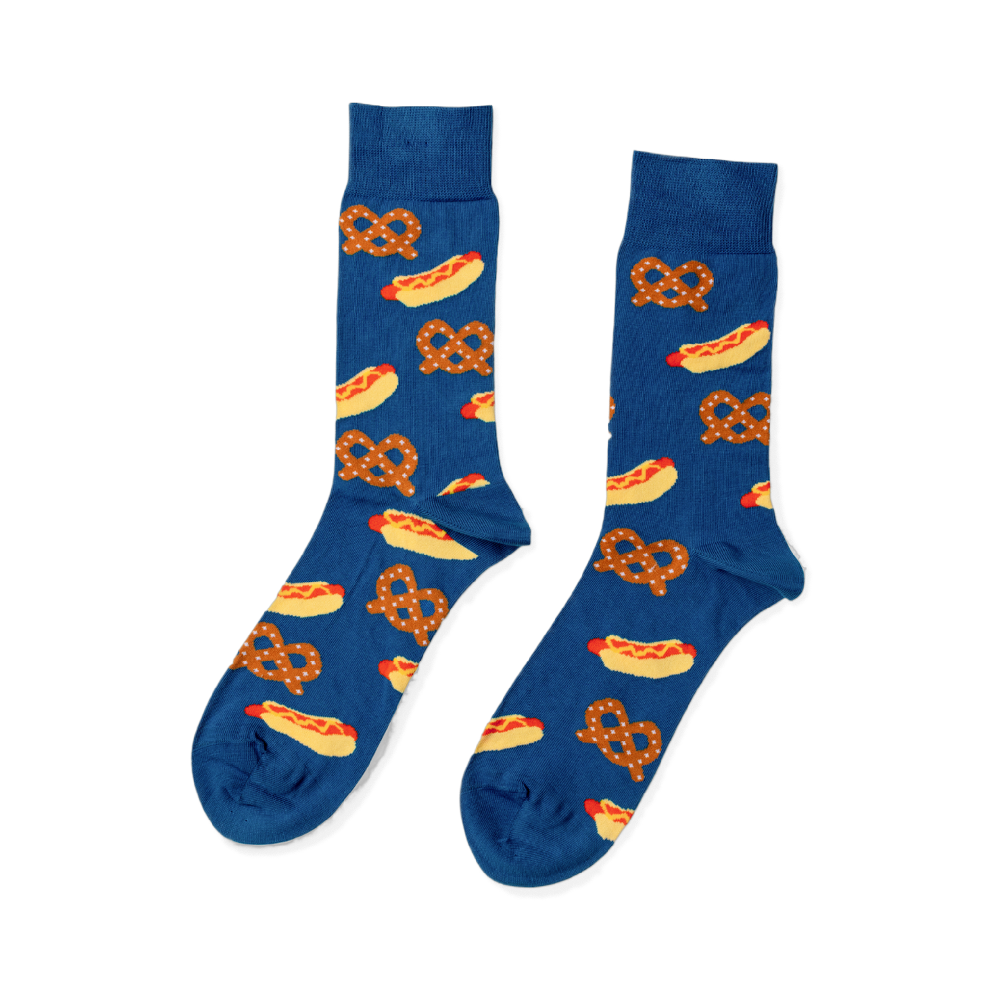 Pair of blue crew socks with a repeating pattern of yellow hot dogs with red sausages and mustard, and brown pretzels.