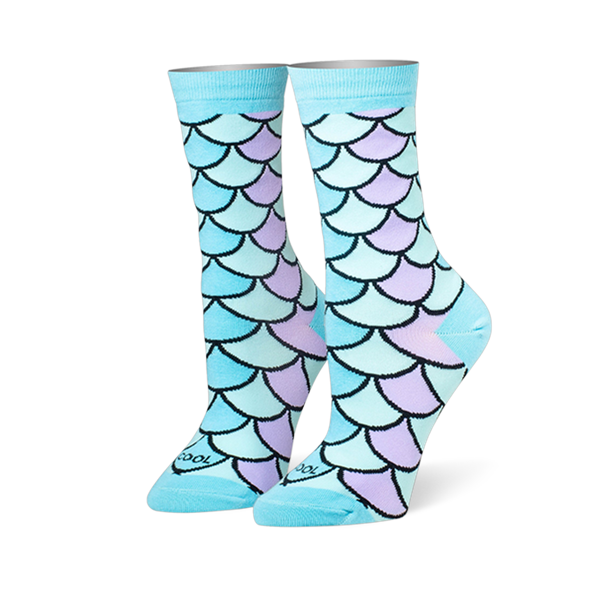 Crew socks featuring a mermaid scale pattern in pastel blue, teal, and lilac with black outlines and solid light blue cuffs.