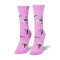 Pair of women's crew socks in light pink, featuring colorful illustrations of women in various yoga poses.