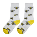 Close-up view of a pair of white socks with yellow bee illustrations.