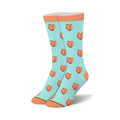 Light blue crew socks featuring a repeating pattern of orange peaches with green leaves and solid peach colored cuffs.