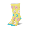 A pair of crew socks with a pastel yellow background and a repeating pattern of pink and blue donuts with sprinkles.