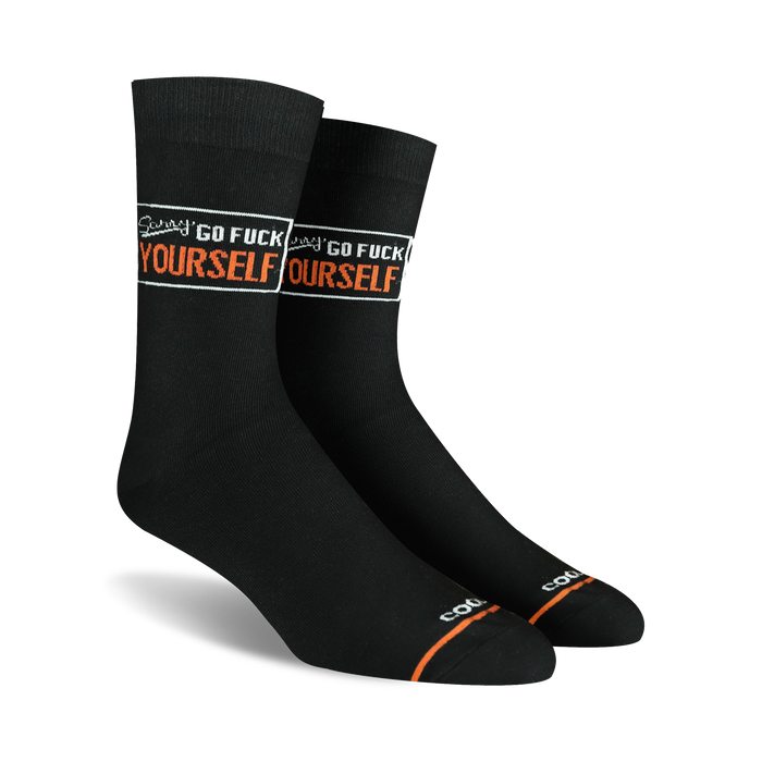 black crew socks with white and orange text that reads 