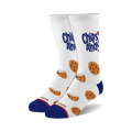 A pair of white crew socks with a Chips Ahoy! cookie crumb design. Blue accents at the heel and toe. The socks feature whole and broken chocolate chip cookies.