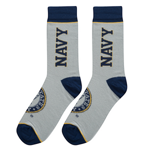 Flatlay showcasing a pair of grey US Navy socks with navy blue cuffs and emblem details.