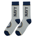 Flatlay showcasing a pair of grey US Navy socks with navy blue cuffs and emblem details.