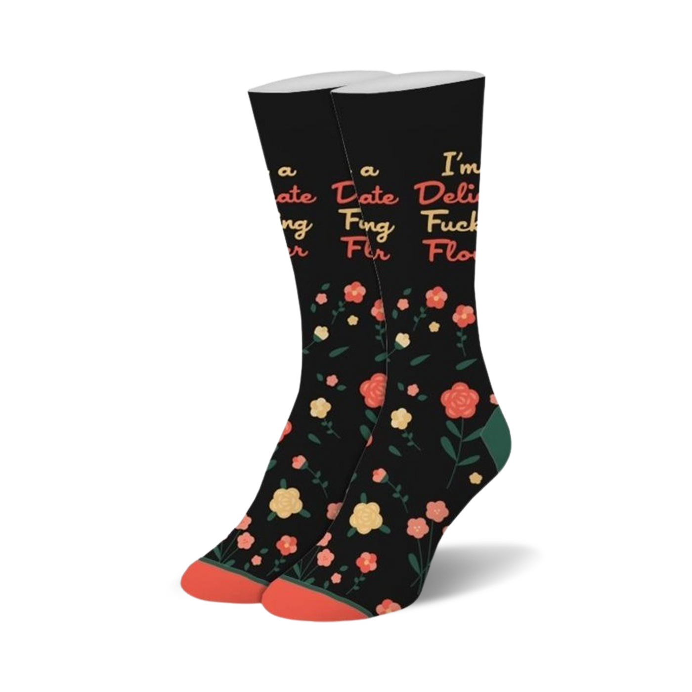 Pair of black crew socks with a scattered coral flower pattern and a playful text overlay.  The text says 'I'm a Delicate Flower'.