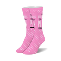 Pair of pink crew socks with white polka dots and the text "On Wednesdays, We Wear Pink" incorporated into the design.