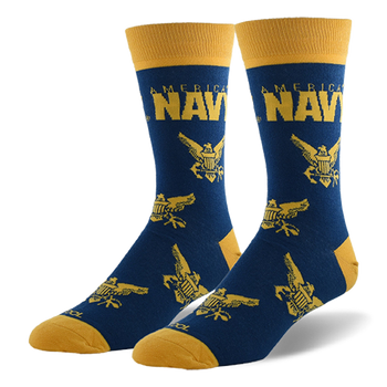 Navy blue crew socks with gold toe, heel, and cuff. Features AMERICA'S NAVY text and repeating gold eagle and anchor emblem.