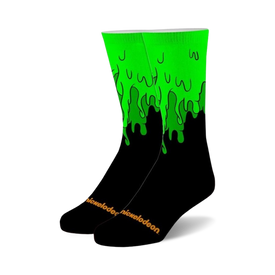 black crew socks featuring a green slime dripping pattern. for men and women.   