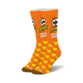 Pair of orange crew socks with a repeating pattern of yellow Pringles chips and the Pringles logo. 