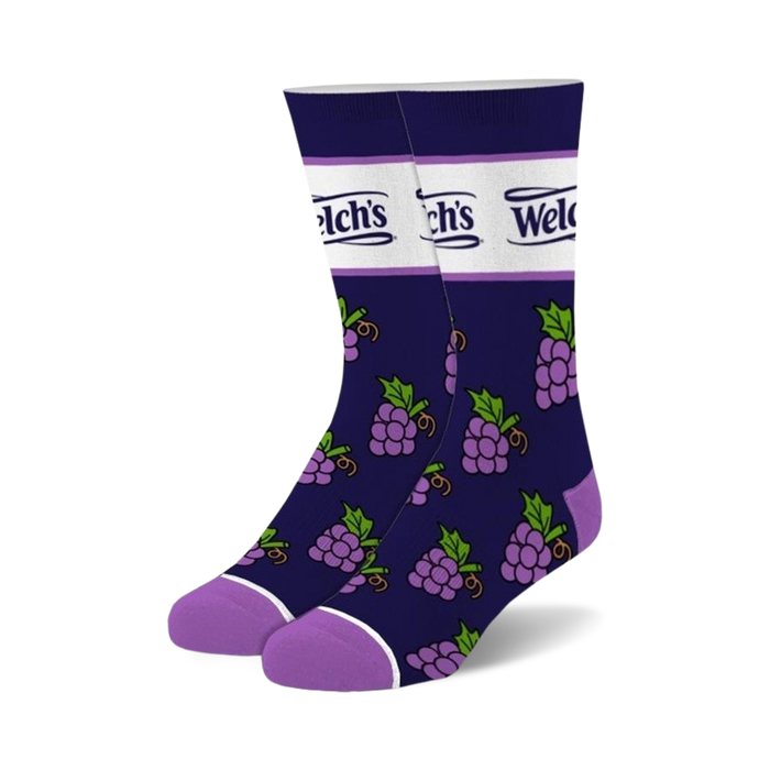 dark blue crew socks with an all-over pattern of purple grapes and green leaves, accented by a white band with purple welch's branding. }}