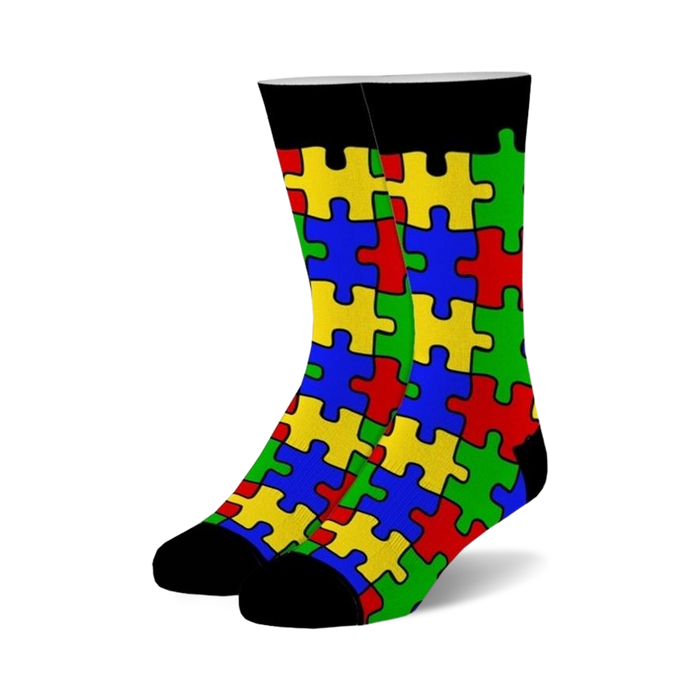 black crew socks with puzzle piece pattern in bright colors; for men and women.   }}
