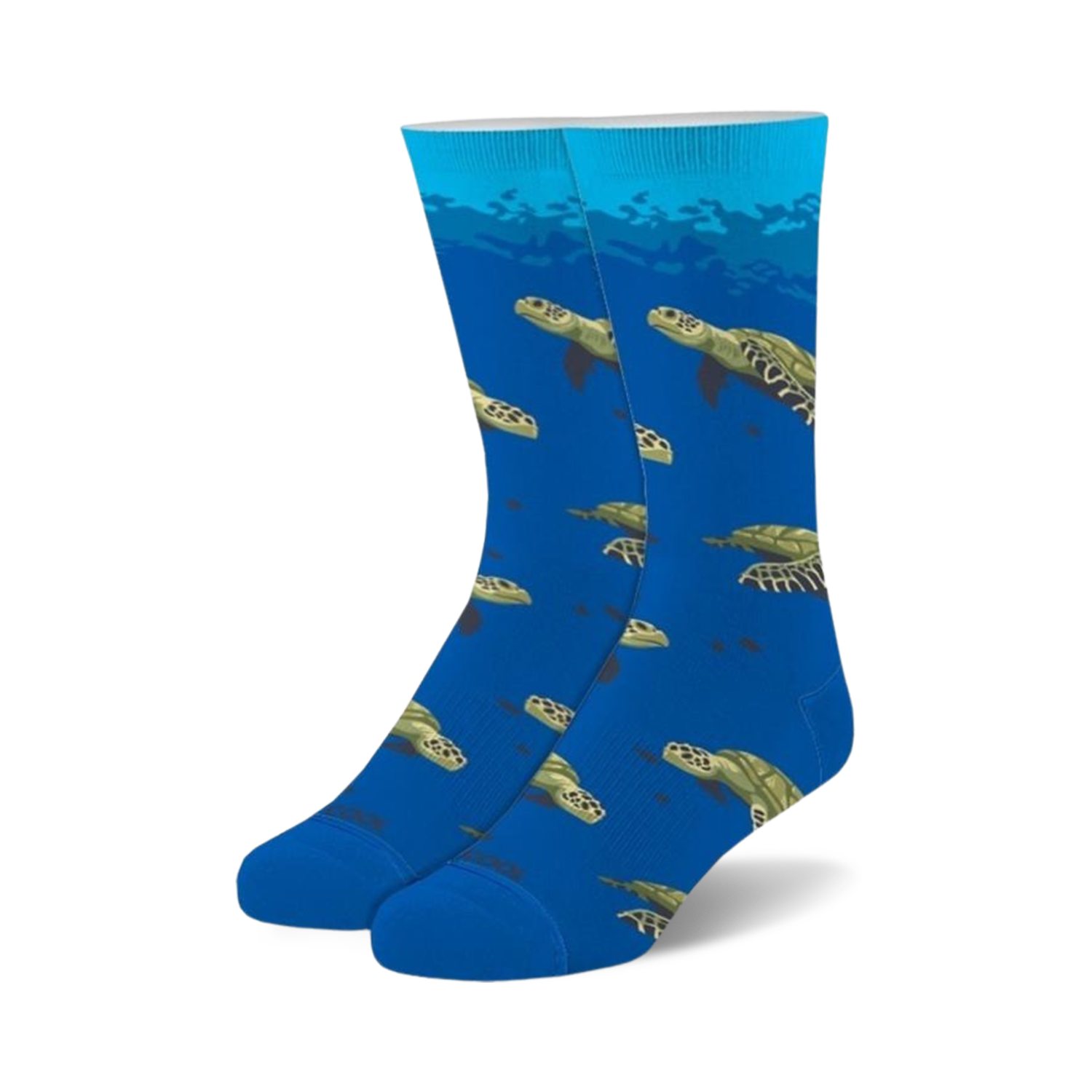 Pair of blue crew socks with a repeating pattern of sea turtles swimming underwater. Green and brown turtles on a bright blue background.