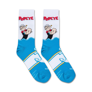 A white sock with a cartoon character, Popeye the Sailor Man, on the leg. He is wearing his signature white hat and red shirt with black sleeves. The sock is over a black background.