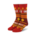 Pair of crew socks in red and gold featuring a repeating Cheez-It cracker box pattern and text.