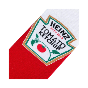 Close-up detail shot of the Heinz Tomato Ketchup label design on the sock, showcasing the intricate embroidery and color details.