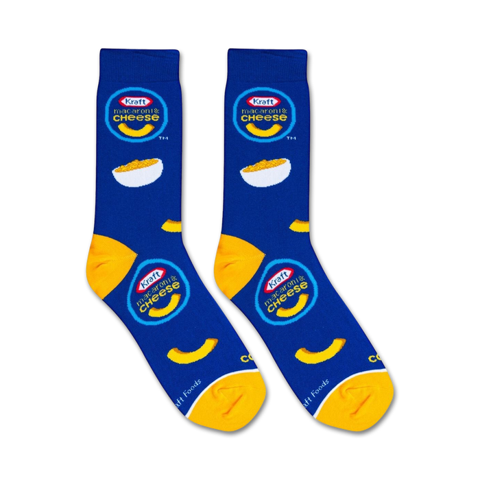 A blue sock with a pattern of yellow macaroni noodles and the Kraft Macaroni & Cheese logo.