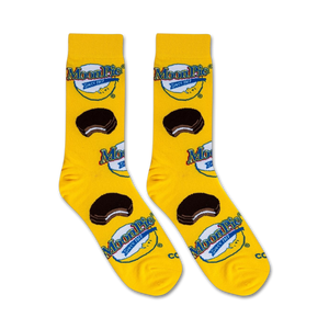 A pair of yellow socks with a design of a chocolate sandwich cookie on each sock.