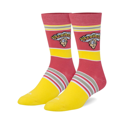 pink and yellow crew socks featuring warheads logo, reinforced toe and heel. unisex.   