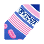 Close-up detail shot of the Pez candy and stripe pattern on the sock fabric.