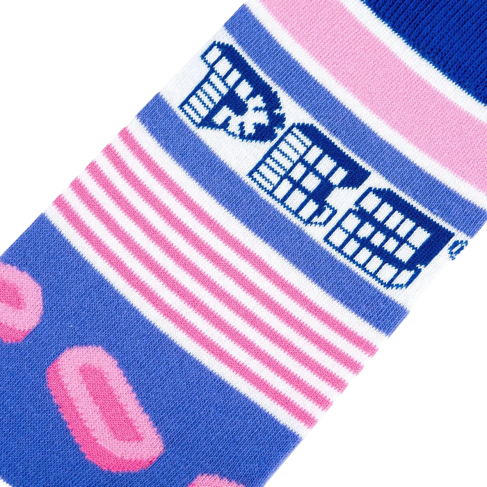A blue sock with pink and white stripes and a repeating pattern of light blue cartoon lips.