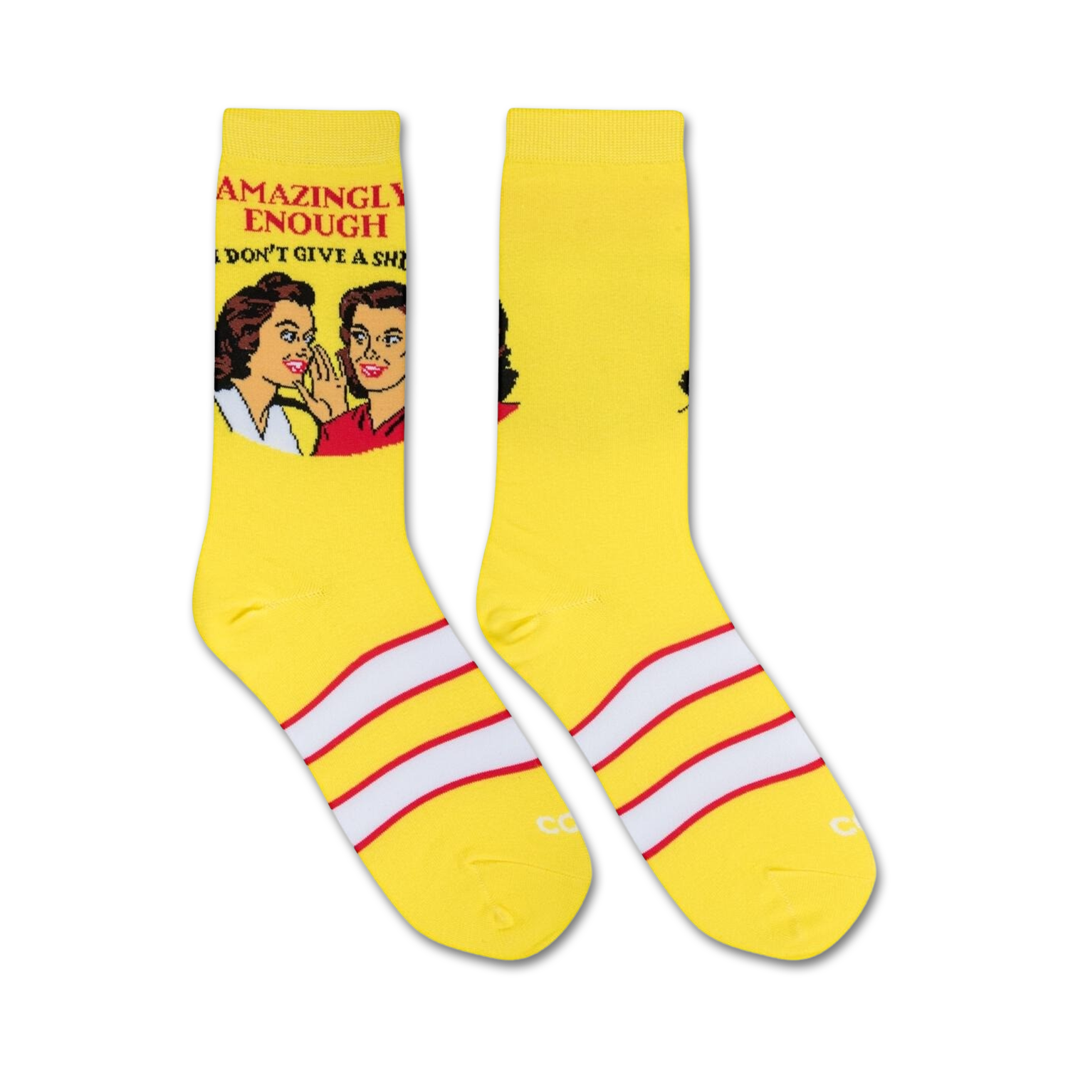 Pair of yellow crew socks featuring a retro graphic of two women gossiping and the text 'Amazingly Enough, I Don't Give A Shit'.