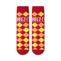 Close-up showing the texture of the Cheez-It Fuzzy socks. The fuzzy red and yellow checkered pattern is clearly visible.