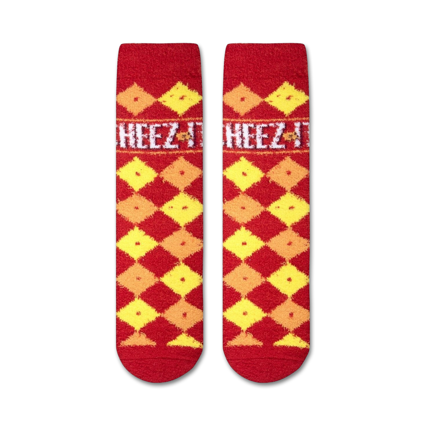 Close-up showing the texture of the Cheez-It Fuzzy socks. The fuzzy red and yellow checkered pattern is clearly visible.