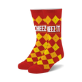 Pair of fuzzy crew socks in red and yellow. Features a Cheez-It cracker-inspired checkered pattern and logo.