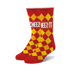 Pair of fuzzy crew socks in red and yellow. Features a Cheez-It cracker-inspired checkered pattern and logo.
