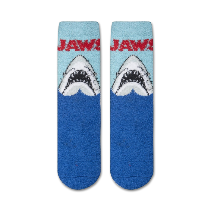 A pair of blue socks with a great white shark design. The shark has its mouth open and is?£??ç???û?ëÖ. The socks are made of a soft, fuzzy material.
